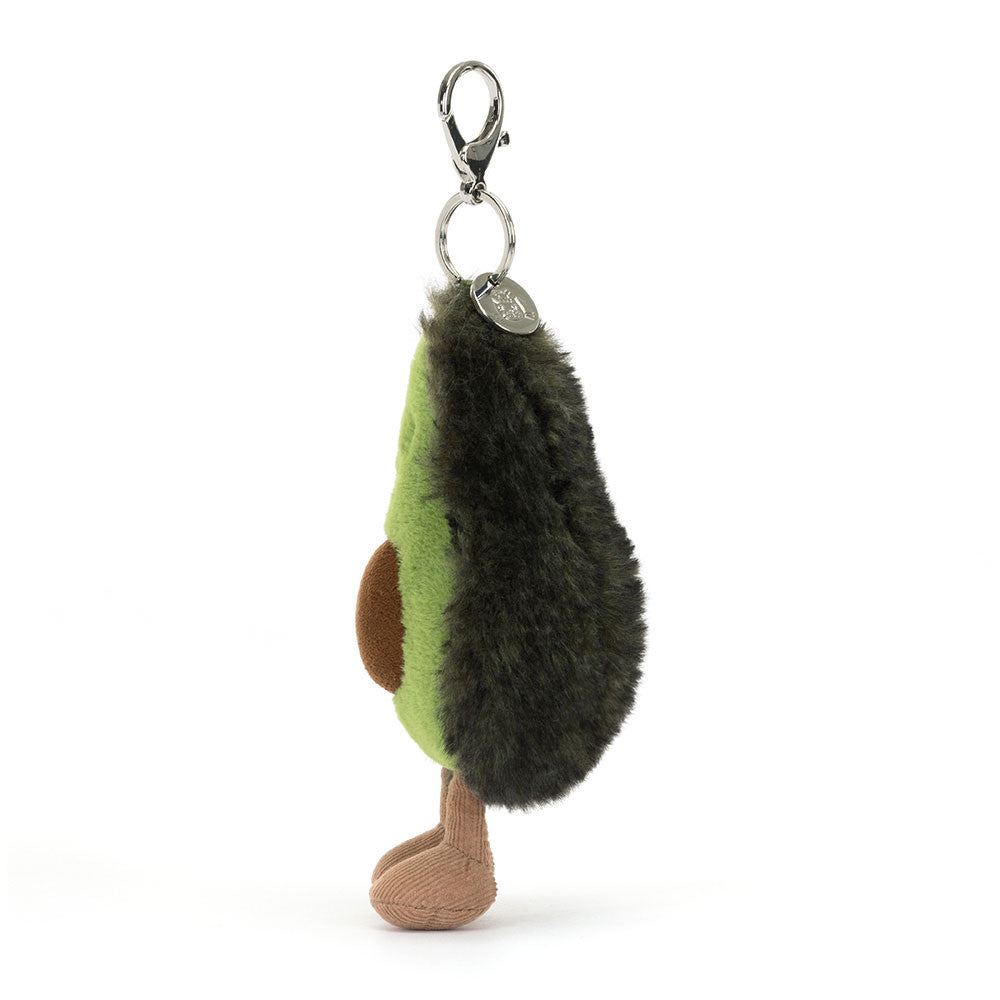 Cute avocado plush bag charm with embroidered smile and dangling feet